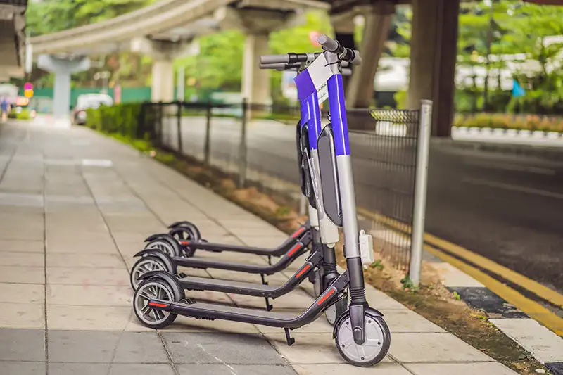 line up of e-scooters