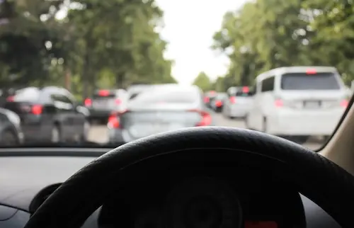 Driver maintaining safe following distance in Atlanta traffic