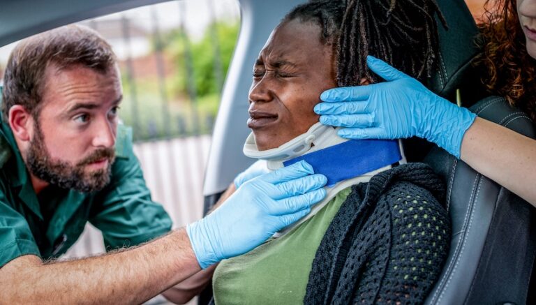 A passenger is receiving medical aid after being in a car accident in Georgia.