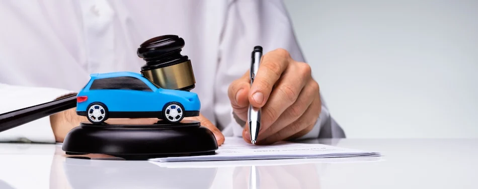 A car accident lawyer is documenting details of the collision at Horst Shewmaker.