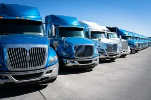 Commercial freight trucks parked at Georgia trucking depot — common source of truck accident claims