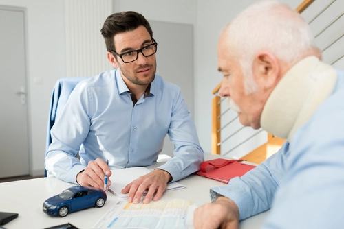 An Alpharetta bicycle accident lawyer speaks with an injured client