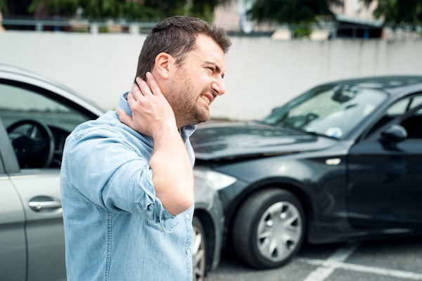 A driver suffers neck pain after a car accident in Alpharetta.